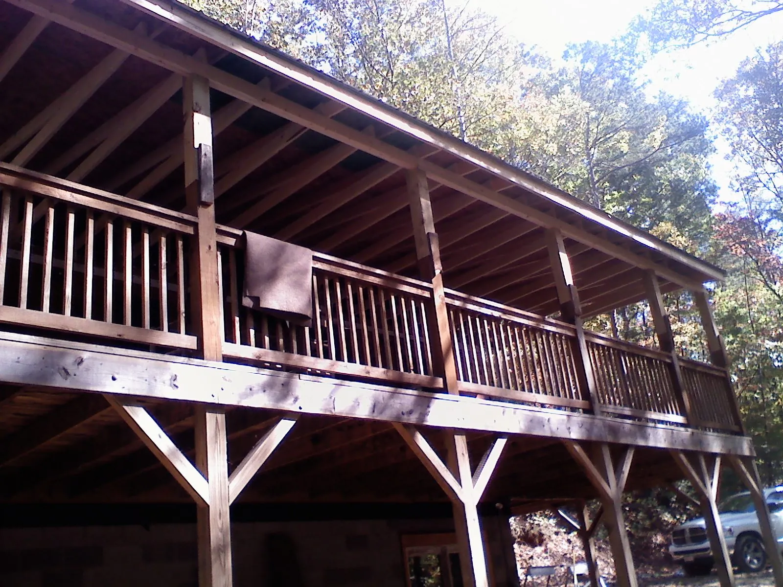 Timber framing under a new elevated porch and deck — Roof Leak Repair in Sidney by Roofing Brothers